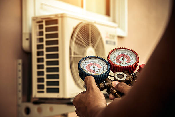 Professional Hvac technician working in Bethesda, MD